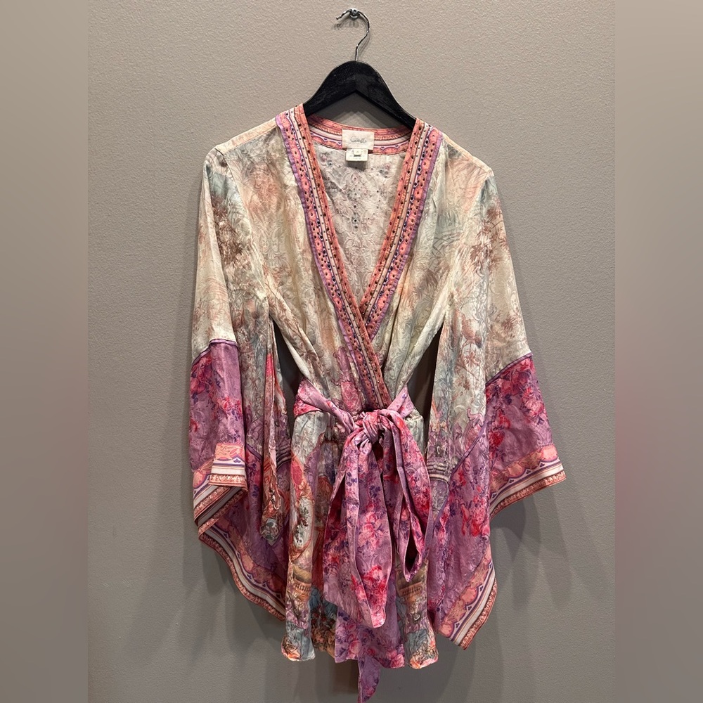 Beautiful pink, printed Camilla romper with a  belt. Kimono style sleeves.